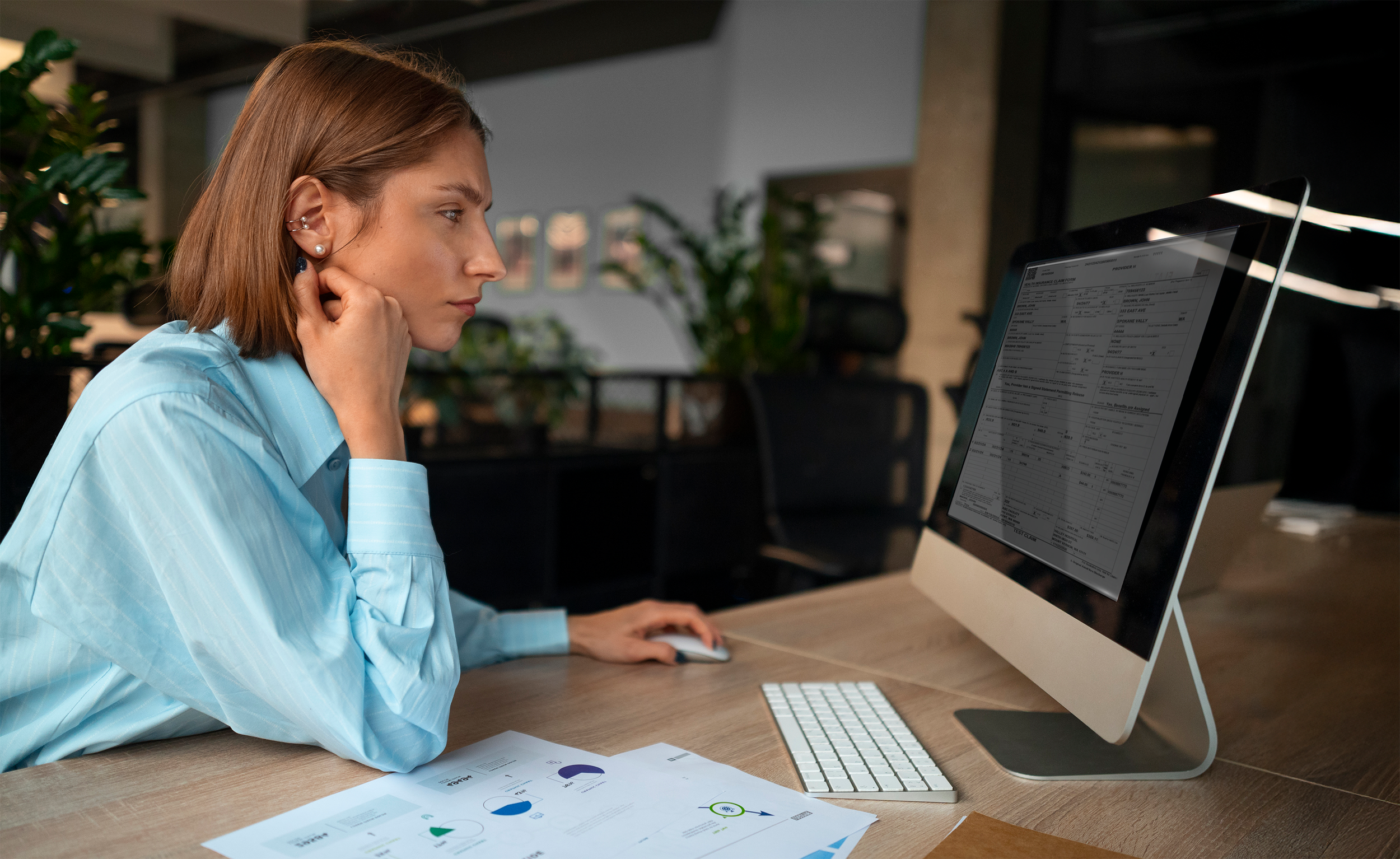 laptop+girl+mock+up2 Manual Document Assignment Creates Bottlenecks and Compliance Risk